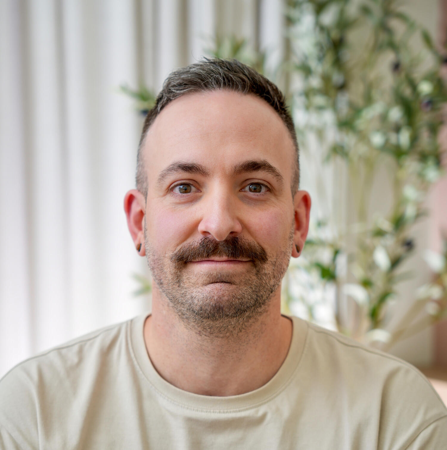 Glenn McGarroch, RMT in Port Moody providing professional LGBT massage therapy services.